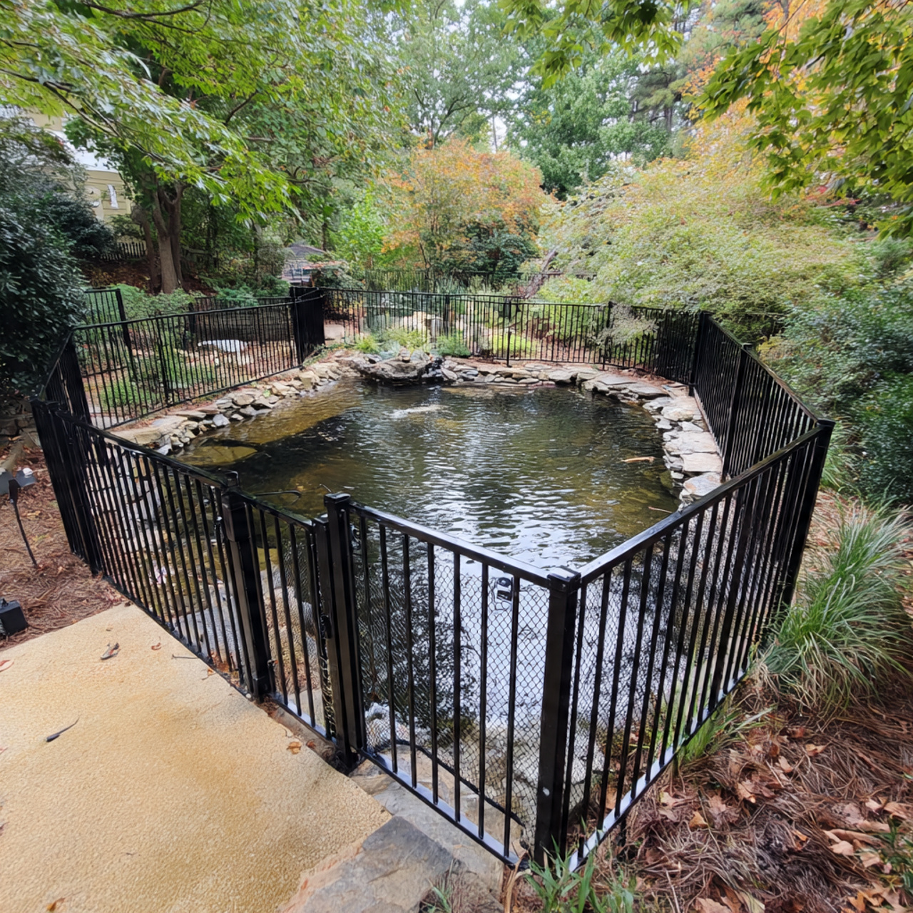 a safe pond installation showing protective black